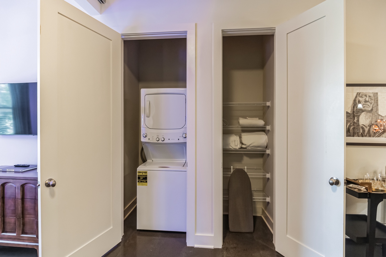 Private laundry is available for your stay, tucked away off the kitchen