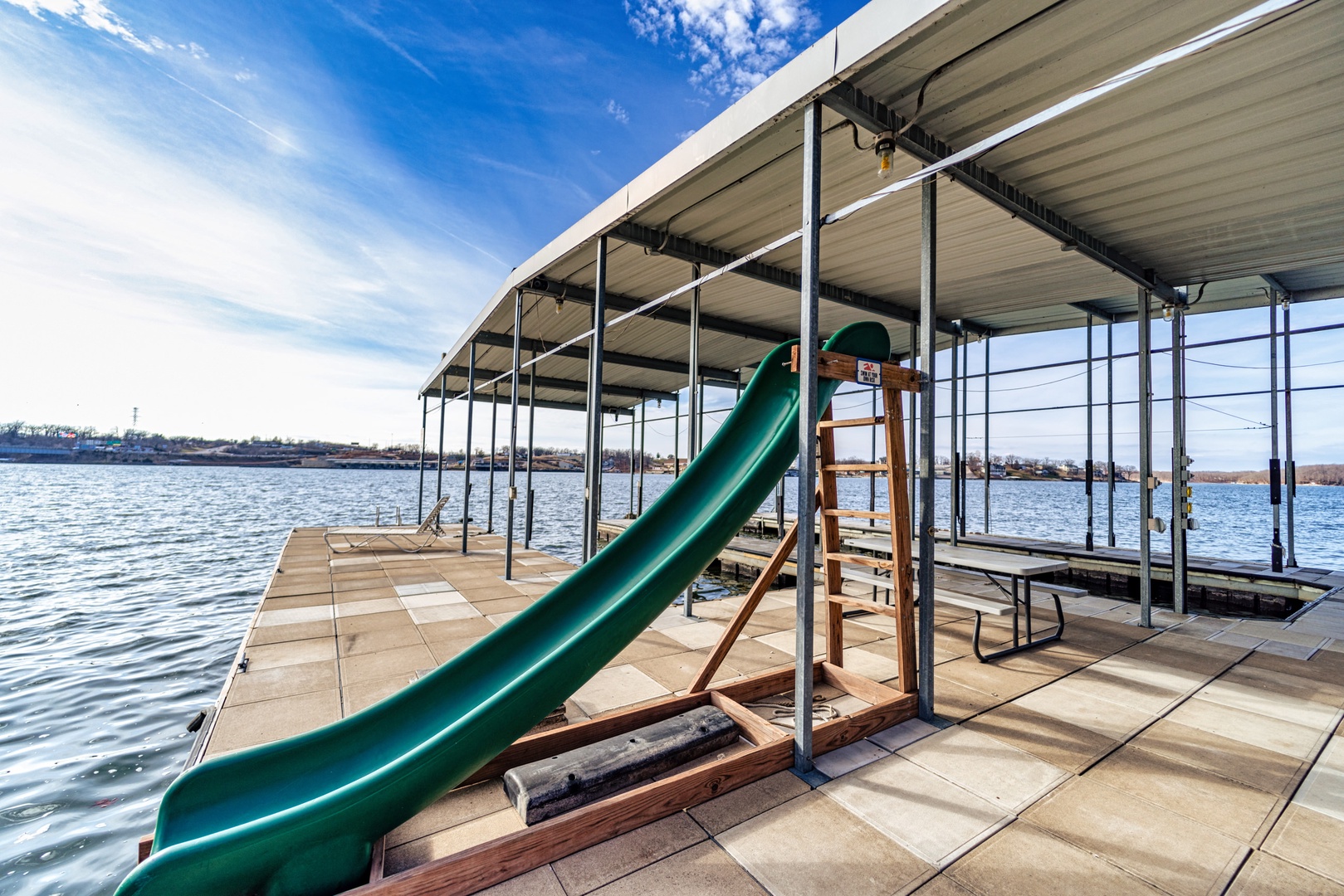 Spacious boat dock with slide