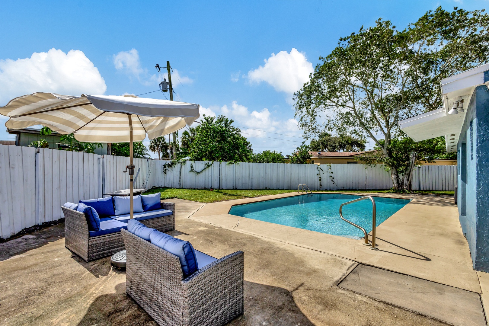 Back yard with private pool and outdoor seating