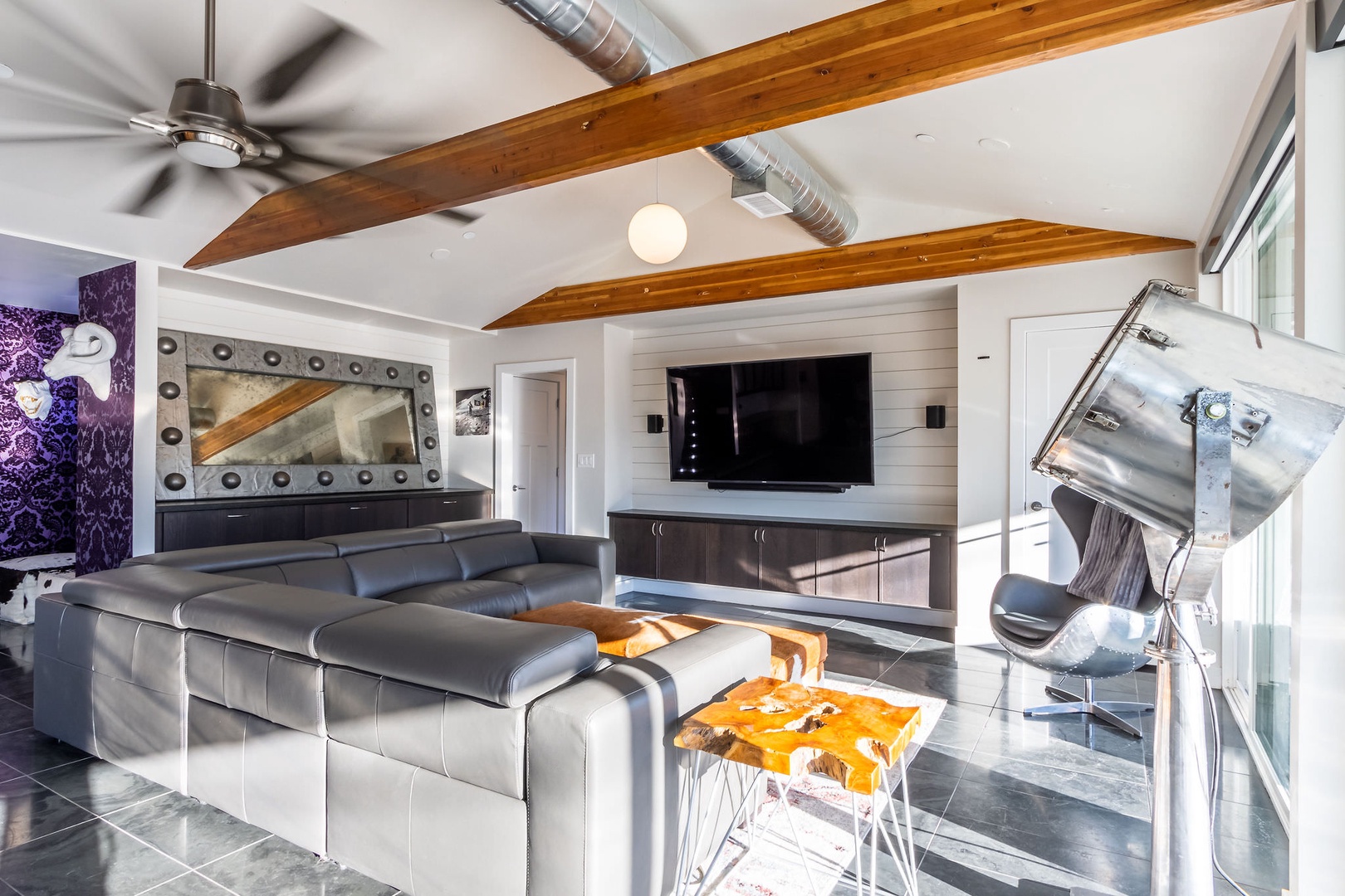 Cozy and spacious living area with TV