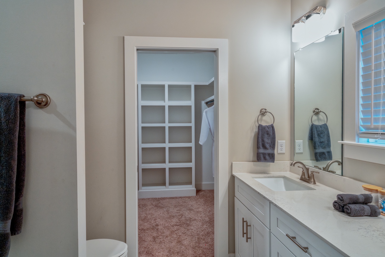 This 3rd floor king ensuite includes a dual vanity, shower, & walk-in closet