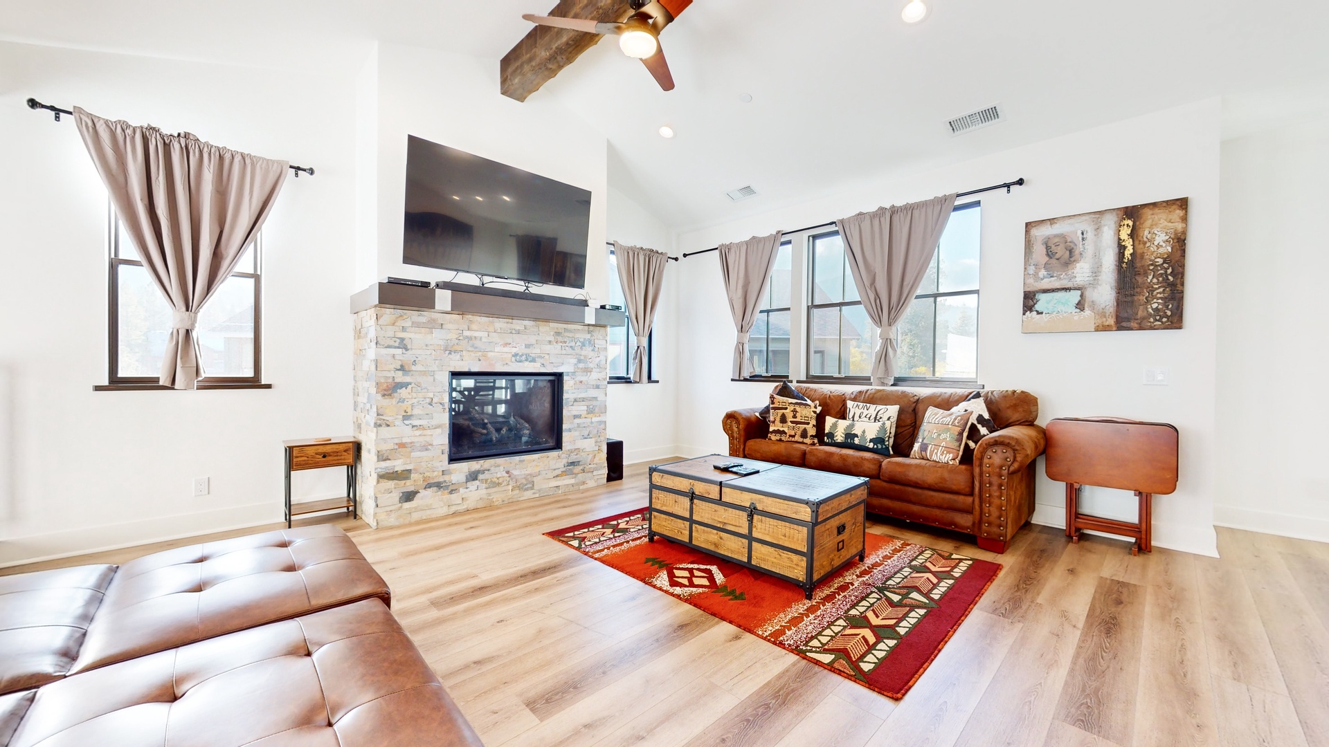 Livingroom with sofa sleeper, gas fireplace, and Smart TV