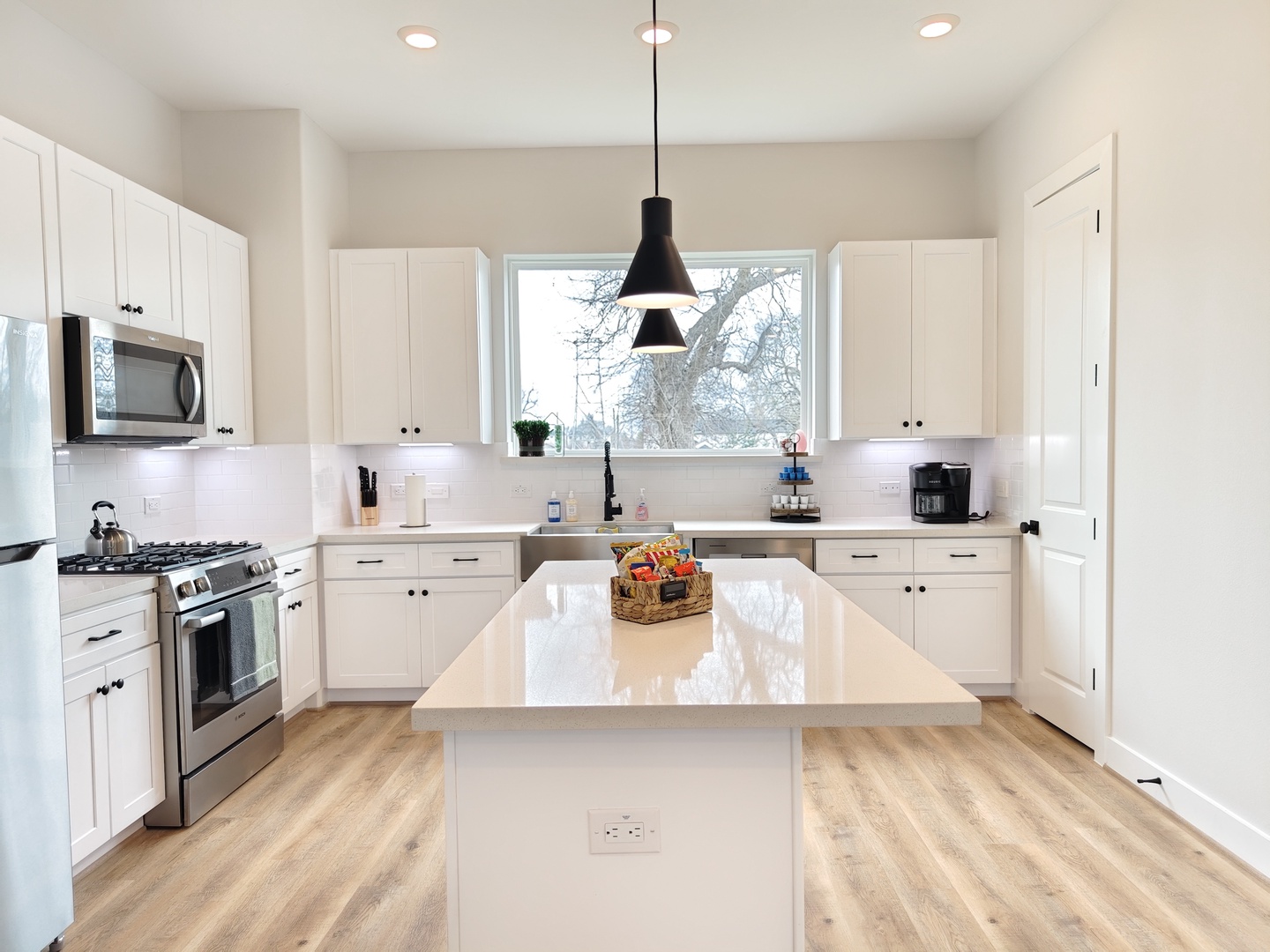 The bright, spacious kitchen offers all the comforts of home
