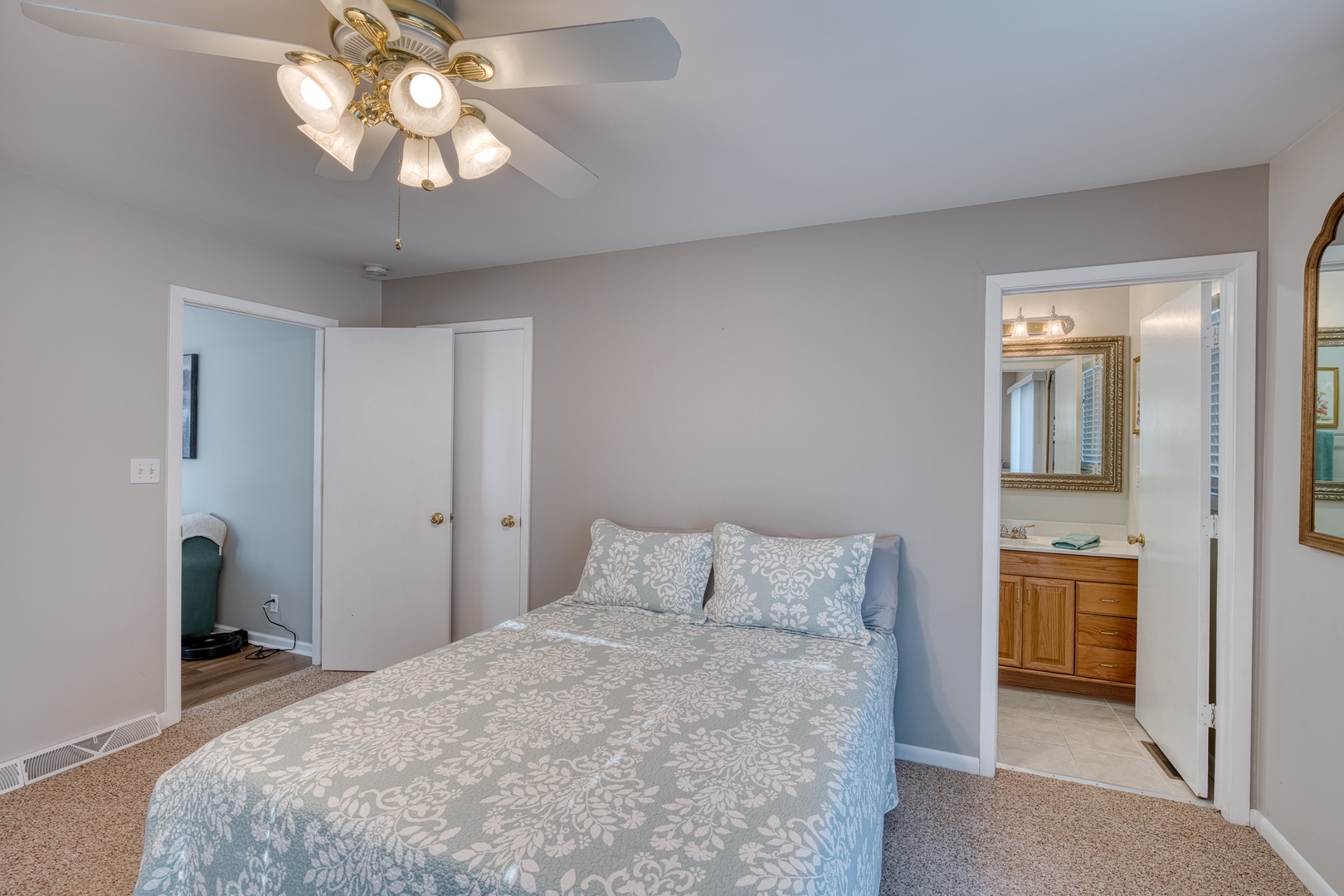 The tranquil queen suite boasts a private ensuite, Smart TV, & deck access
