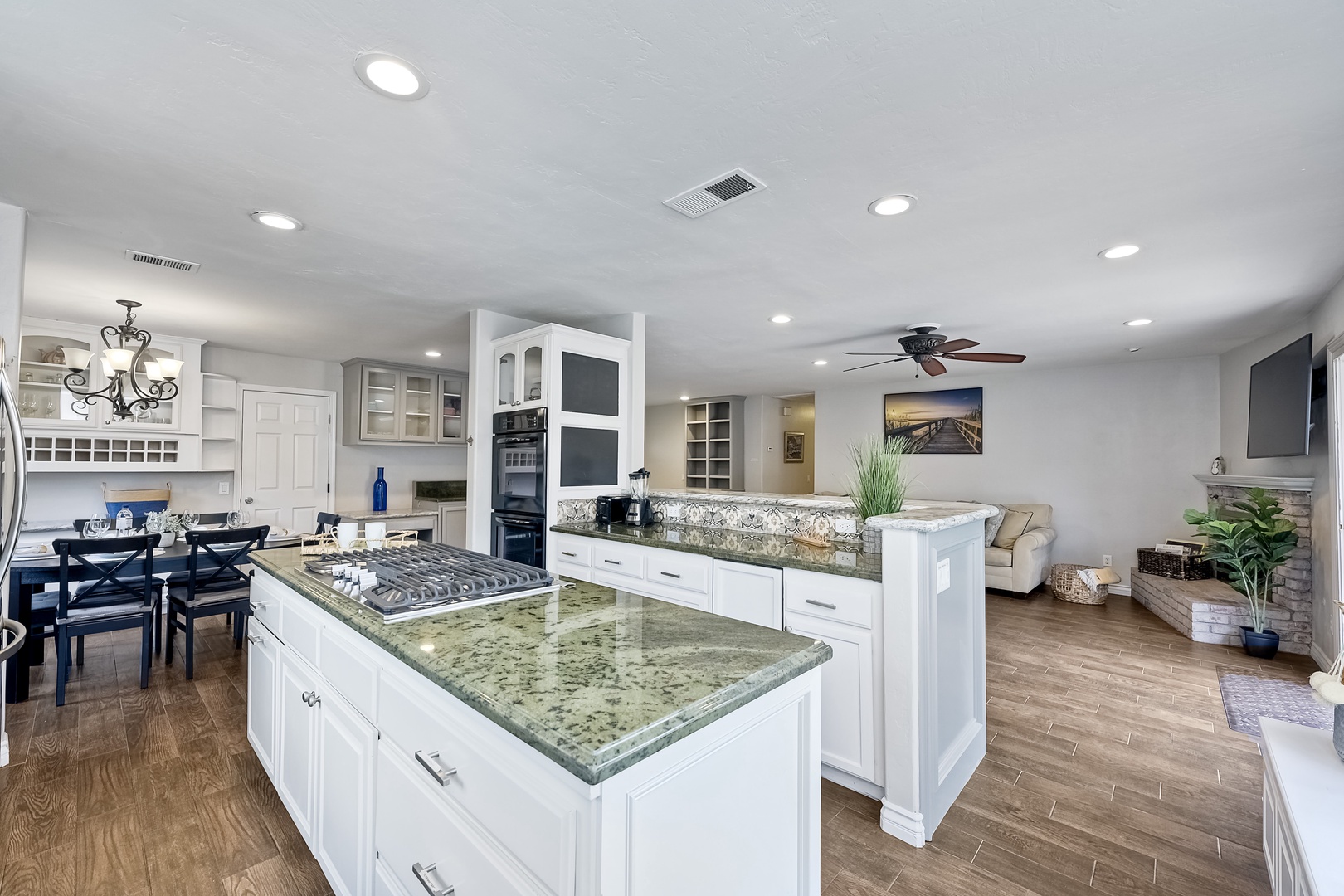 The open, modern kitchen offers ample space & all the comforts of home