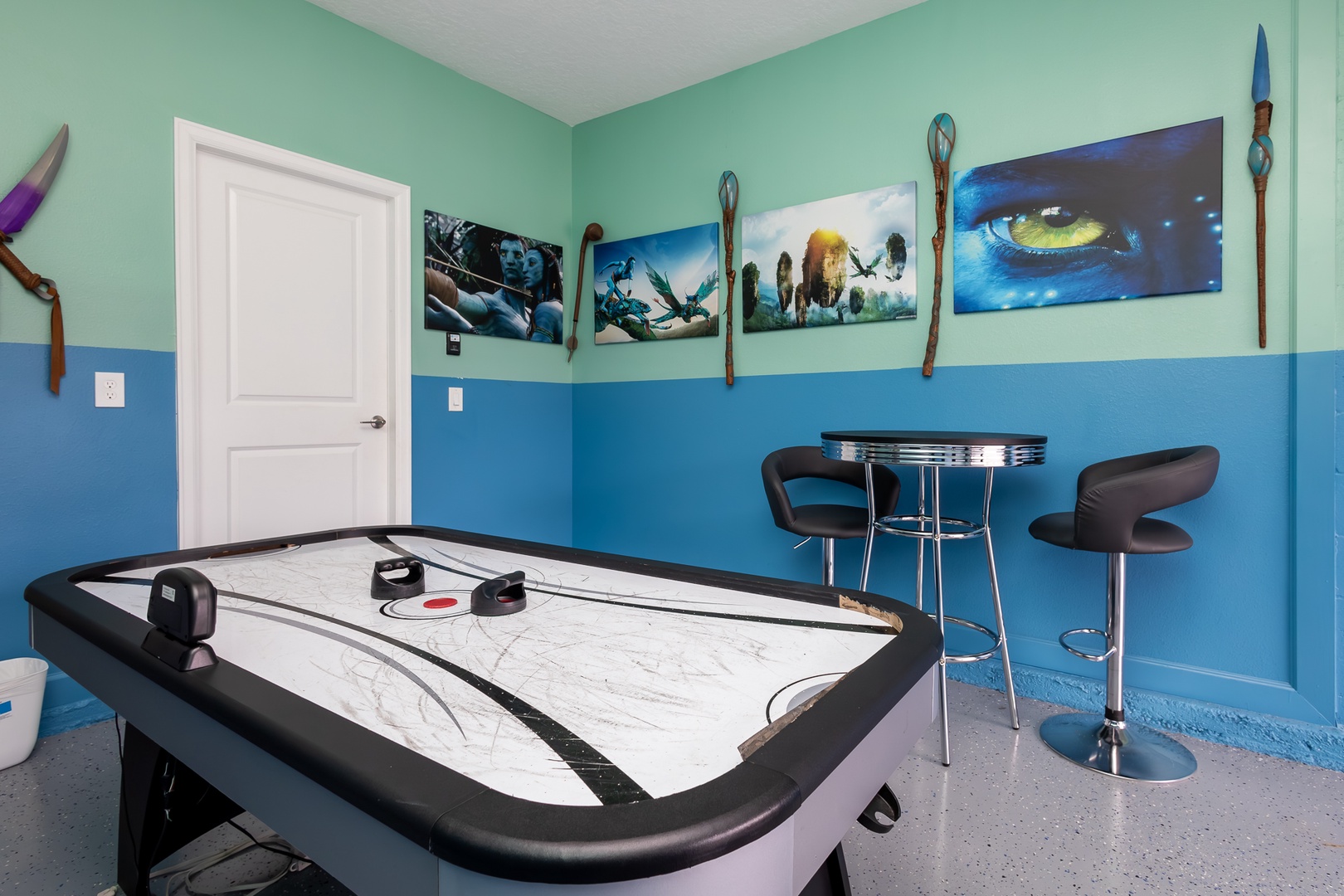 Unleash your competitive side in the garage-conversion game room!