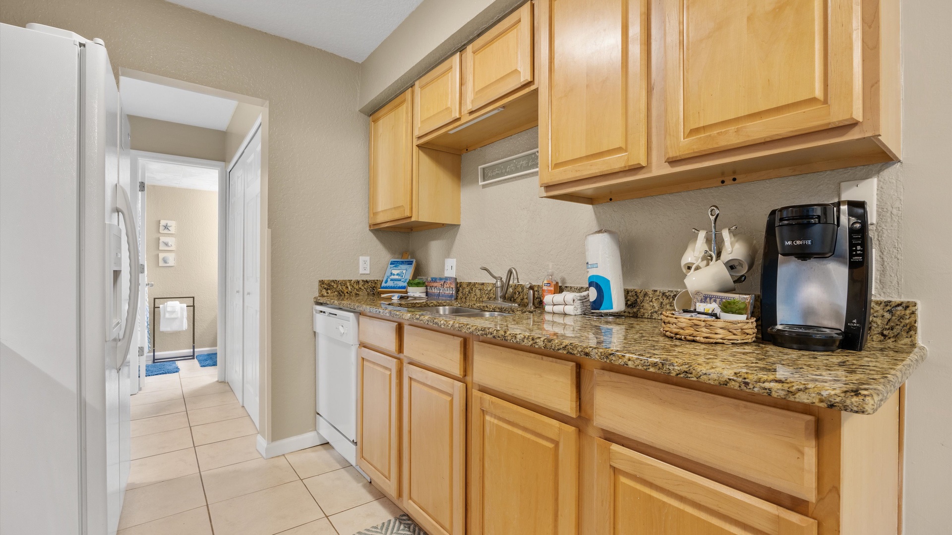 The kitchen offers ample space & all the comforts of home