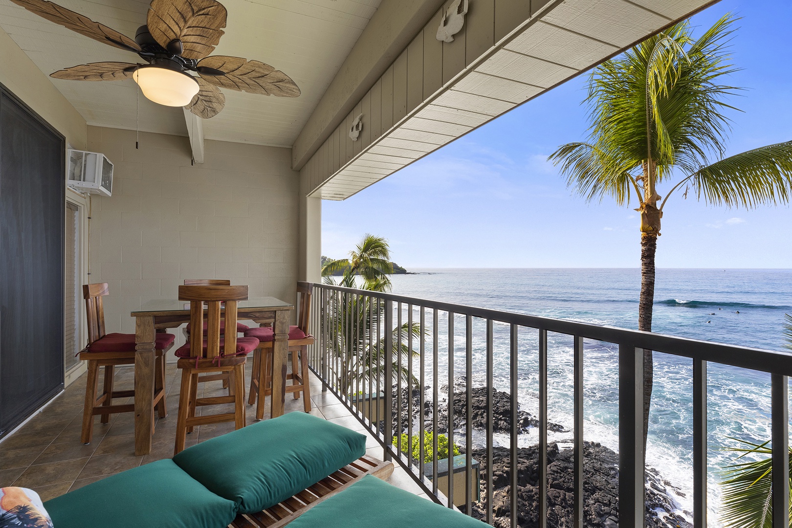 Oceanfront lanai with amazing blue water views and seating