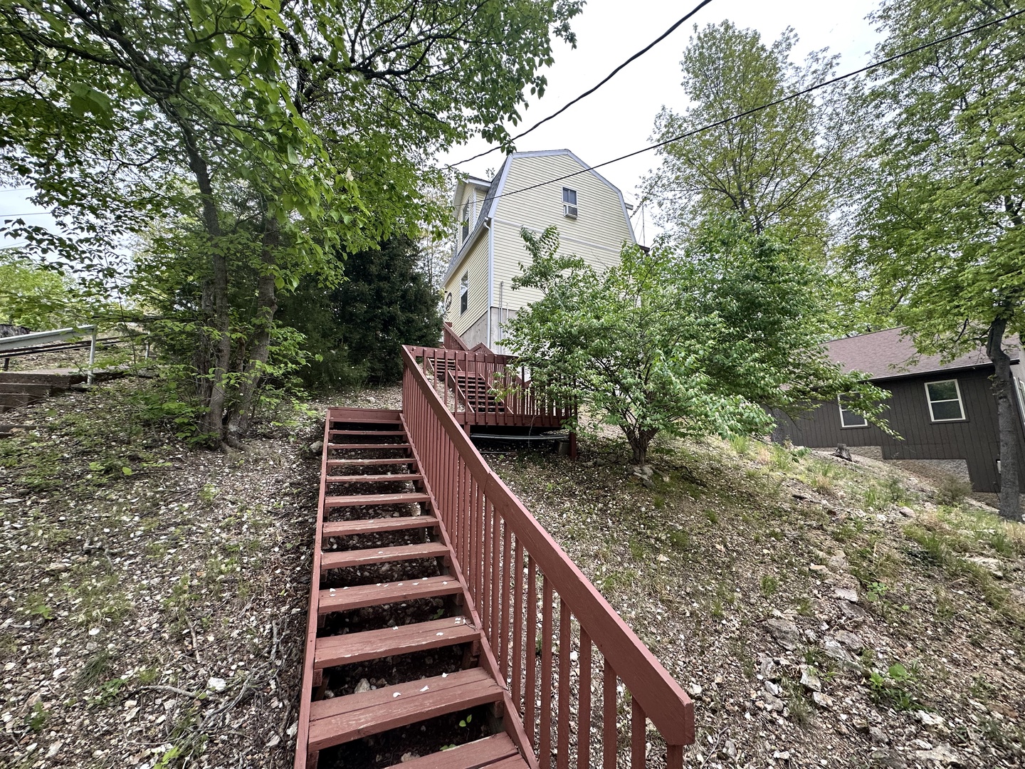 Stairs up to garage and parking