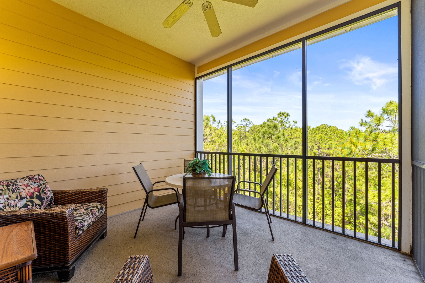 Enjoy morning coffee or dine alfresco on the breezy screened balcony