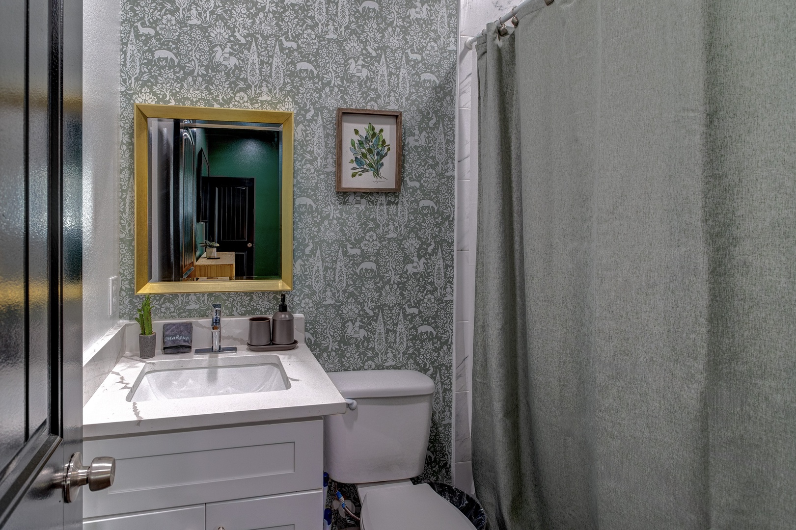 A single vanity & shower await in this ensuite bathroom