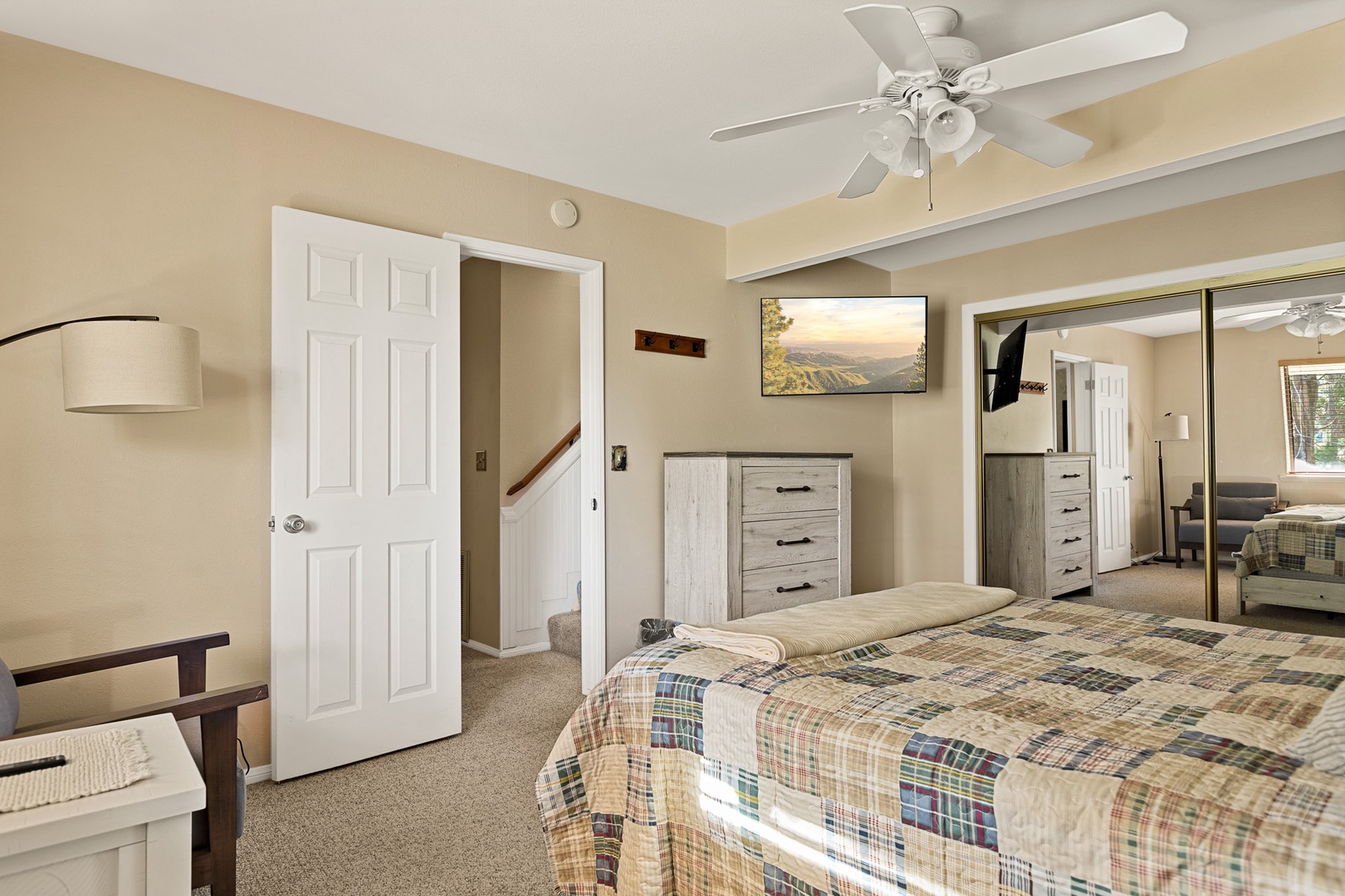 The 1st of two bedroom offers a queen bed, ceiling fan, & plenty of space