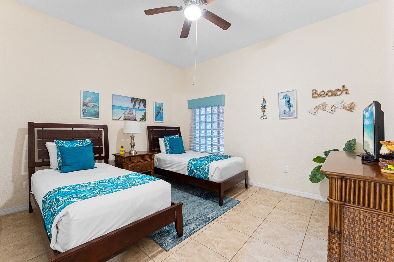 The bedroom retreat offers two plush twin beds & cable TV