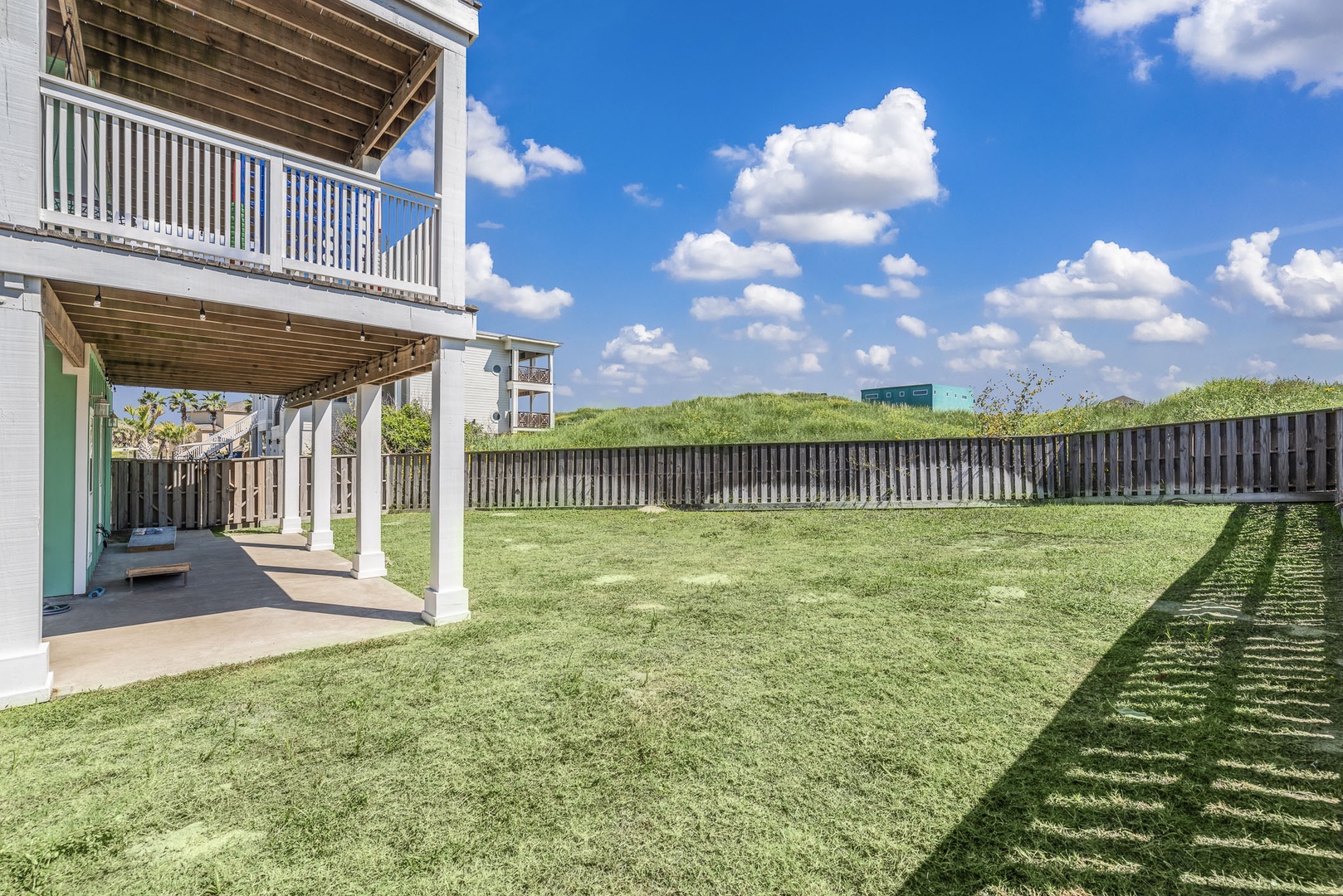 The back yard offers plenty of space for outdoor fun and play