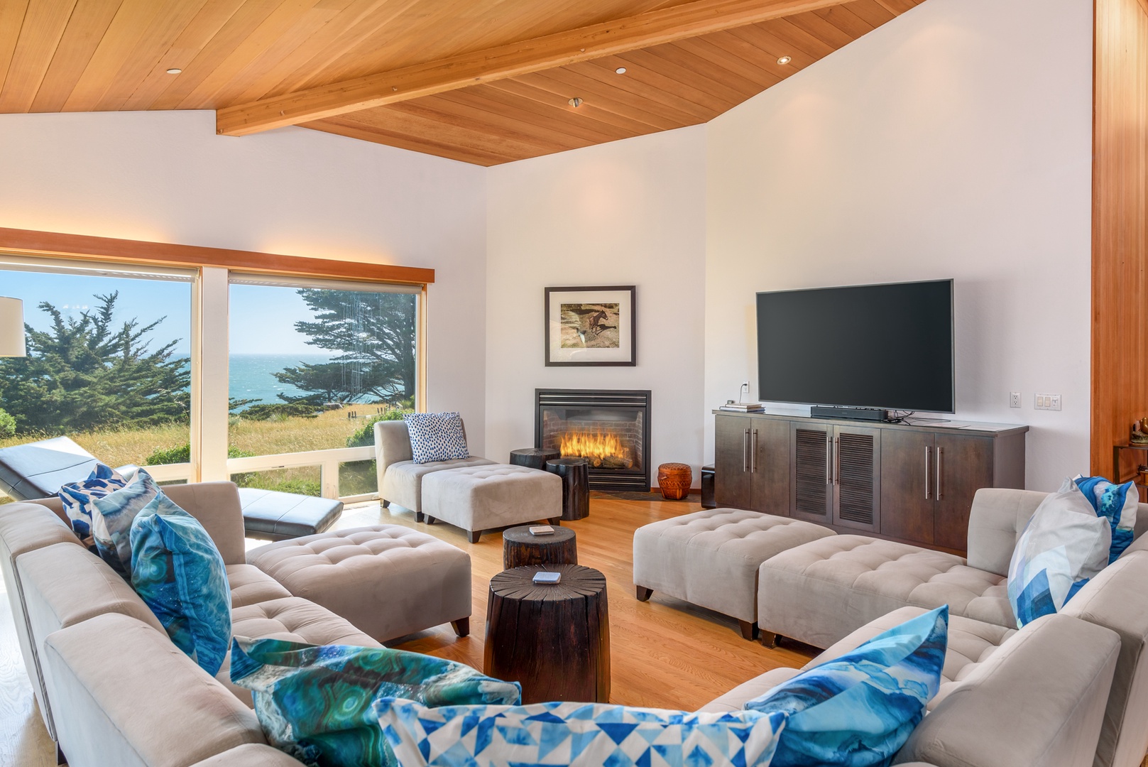 Ocean view living room w/ Smart TV and gas fireplace