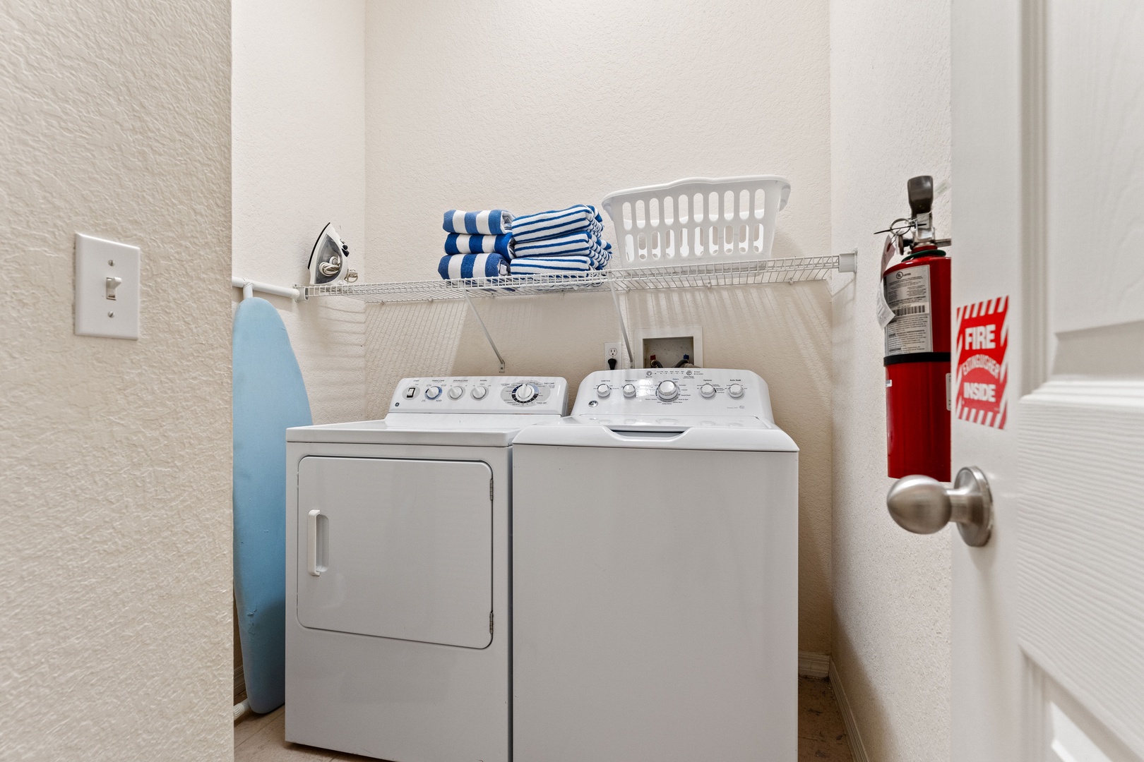 Private laundry available for your stay near entryway