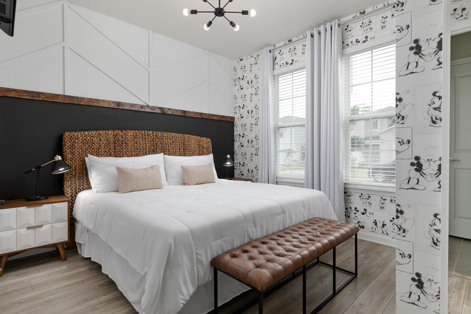This chic 1st floor bedroom offers a king bed & Smart TV