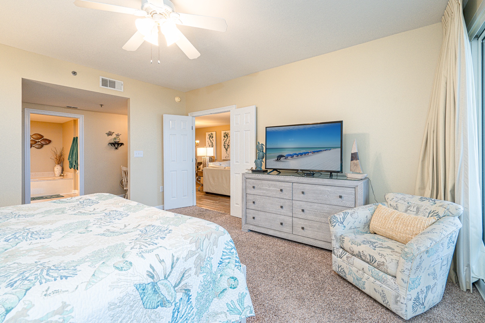 The king suite boasts a private ensuite, TV, & gorgeous water views