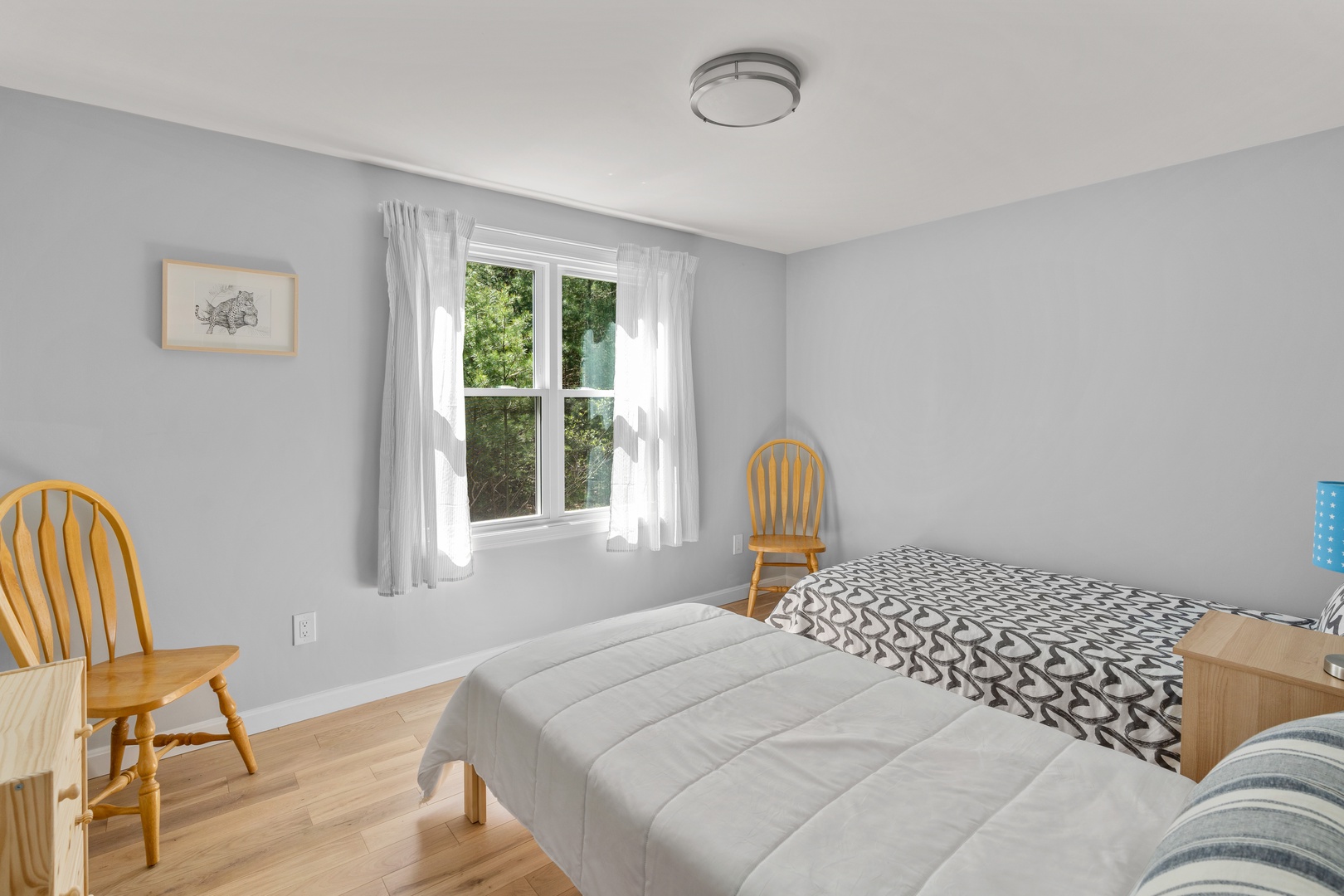 A pair of cozy twin beds is available in this first-floor bedroom