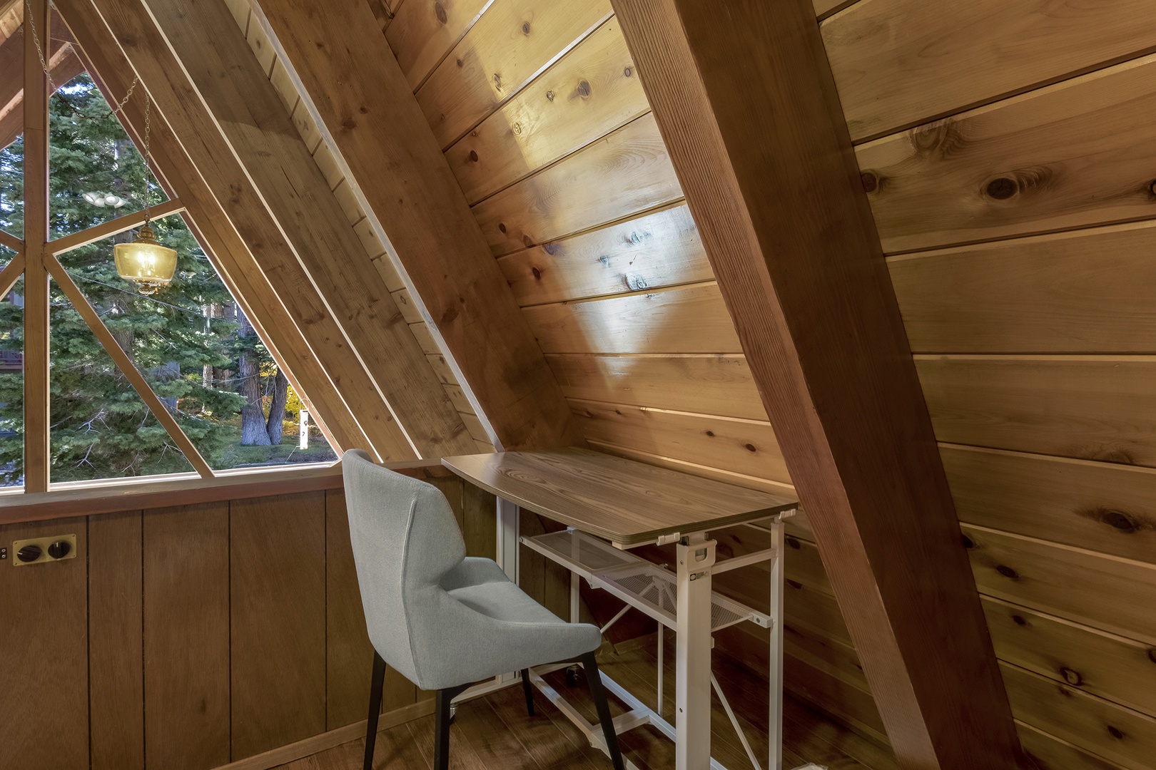 Loft with a sleek desk setup, perfect for work and creativity