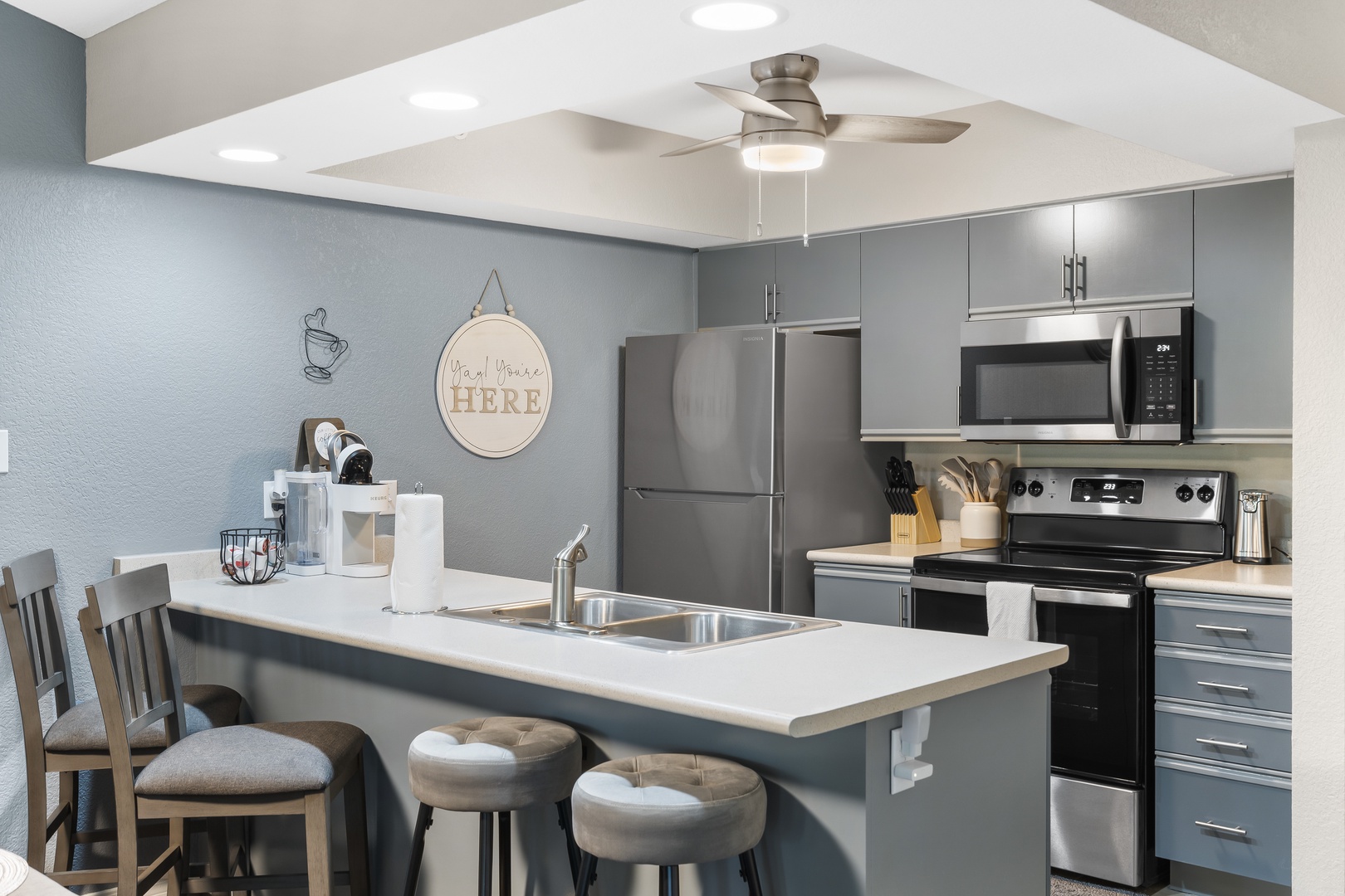 Sip morning coffee or grab a bite at the kitchen counter, with space for 4