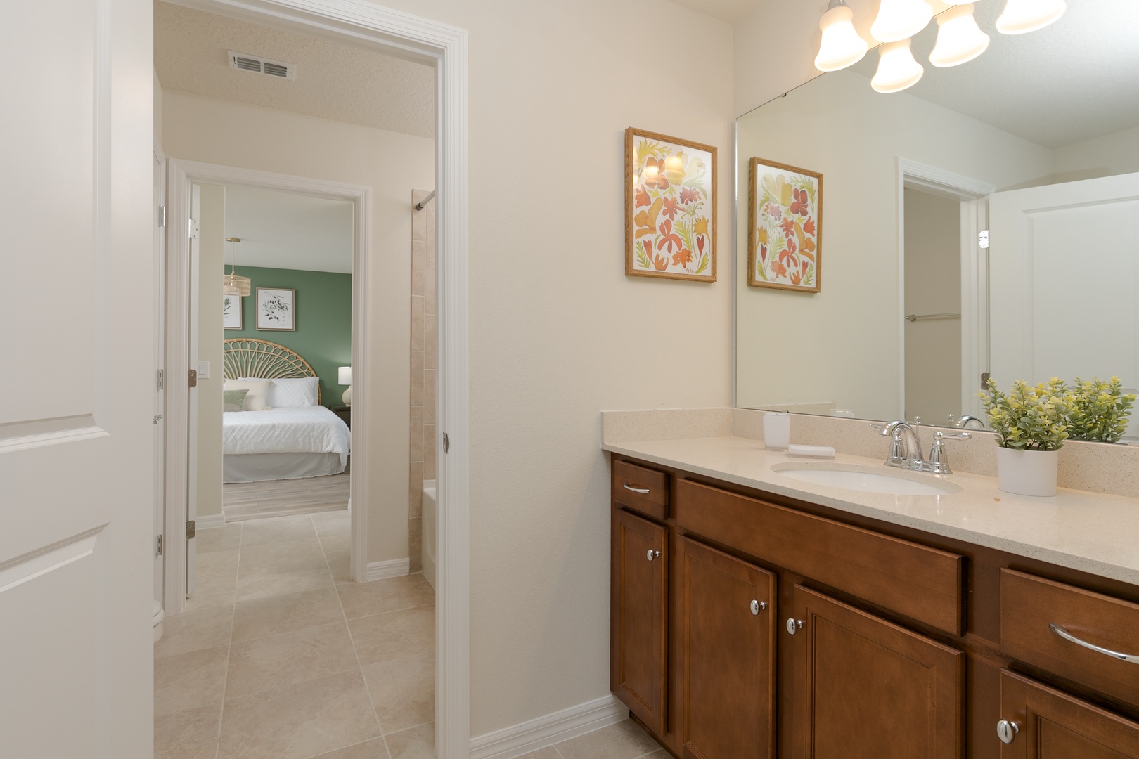 The 2nd floor Jack & Jill bathroom offers two vanities & a shower/tub combo