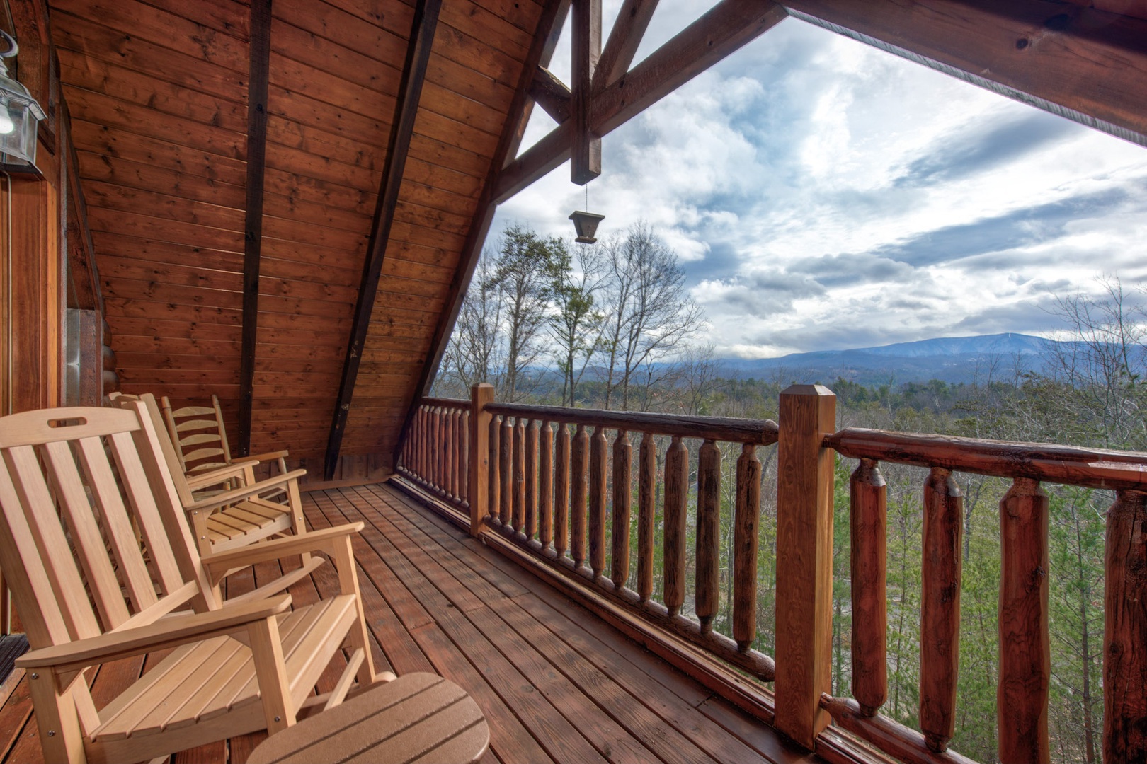 Lounge the day away with treehouse-like views on the upper-level balcony
