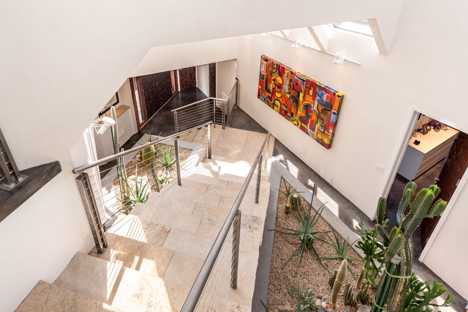 Ascend the Insta-worthy staircase to reach the stunning second floor