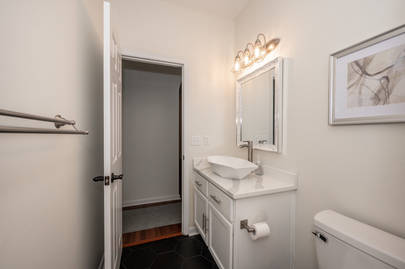 The 2nd floor full bath offers a stylish vanity & shower/tub combo