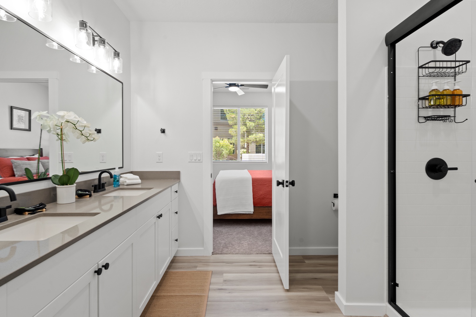 Enjoy a double vanity & glass shower in this main-floor ensuite