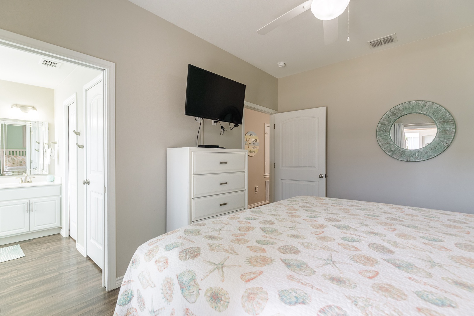 The primary king suite offers a private en suite, Smart TV, & private balcony