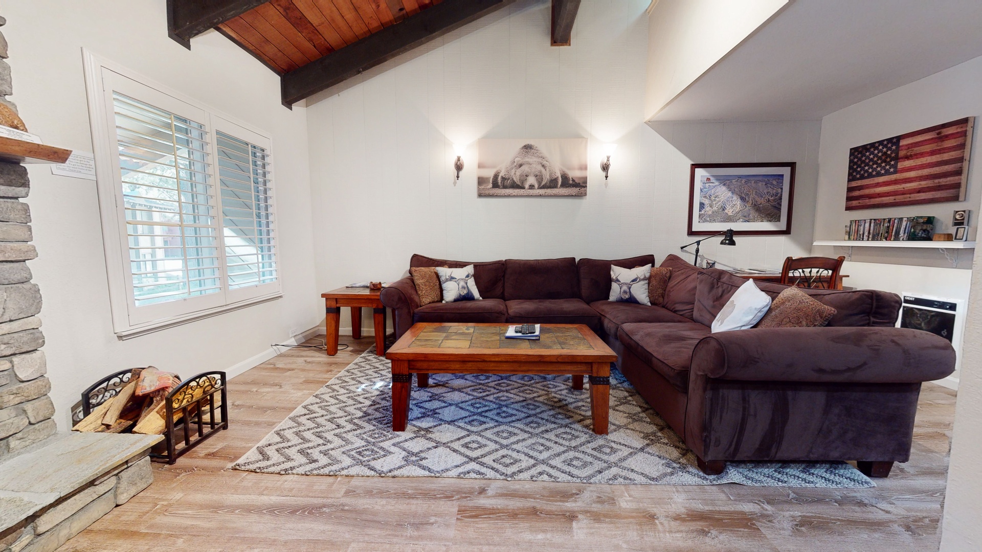 Living room w/ TV, DVD player, wood burning fireplace