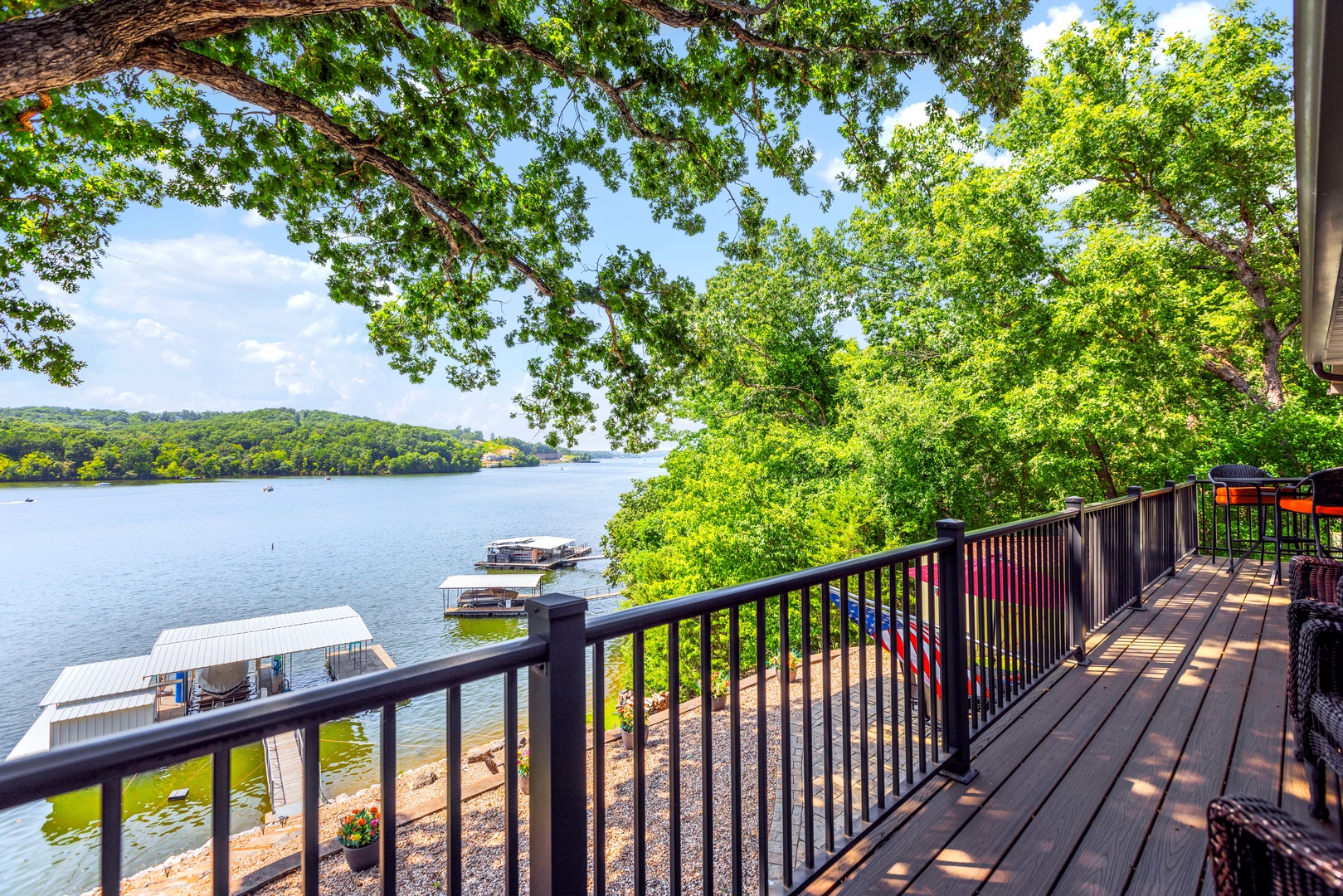 Sip morning coffee or enjoy an evening cocktail with lake views from the deck