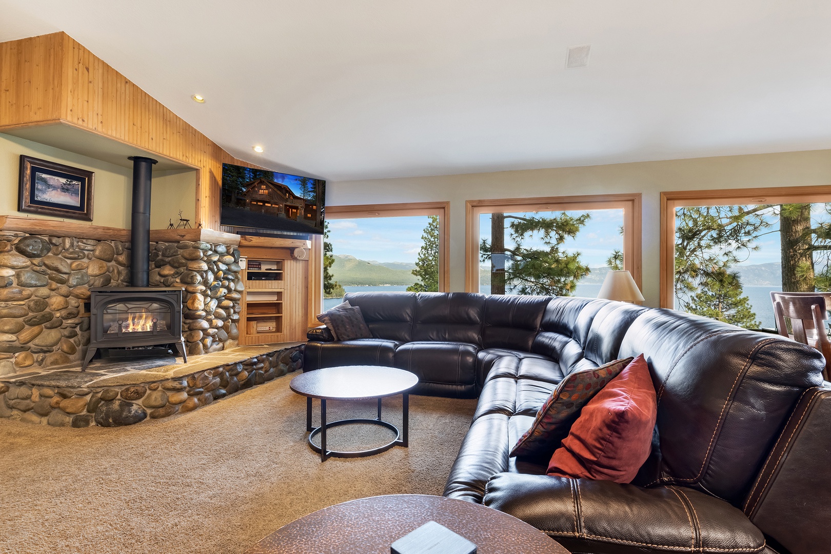 Bright living area with leather seating, and Smart TV