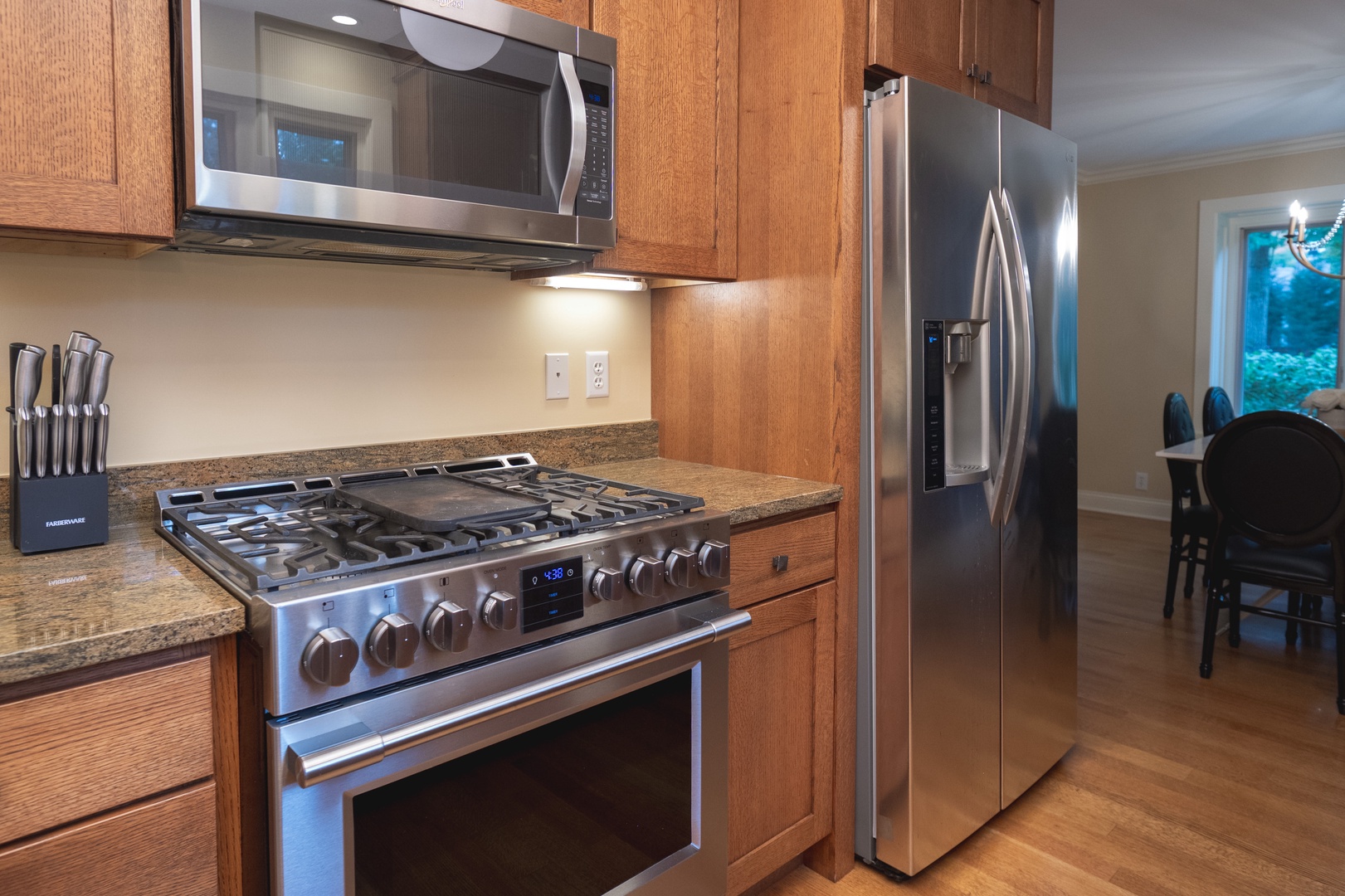 The fully equipped kitchen offers ample space & all the comforts of home