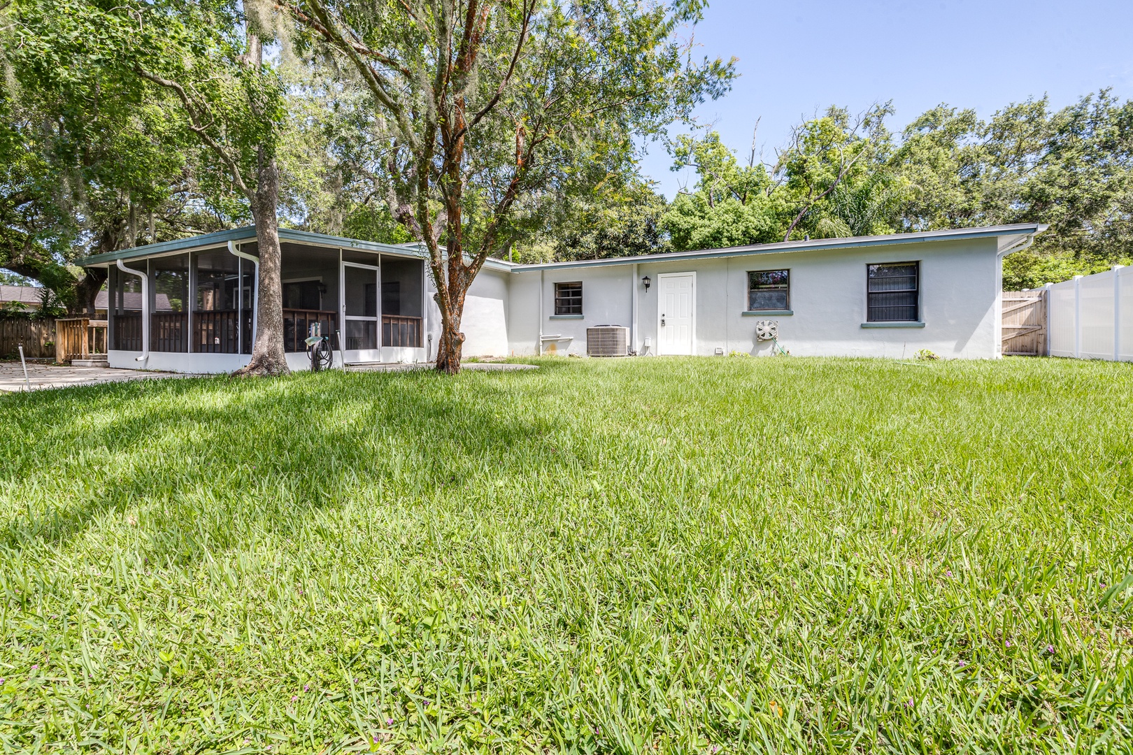 The large back yard offers loads of space for relaxation & play