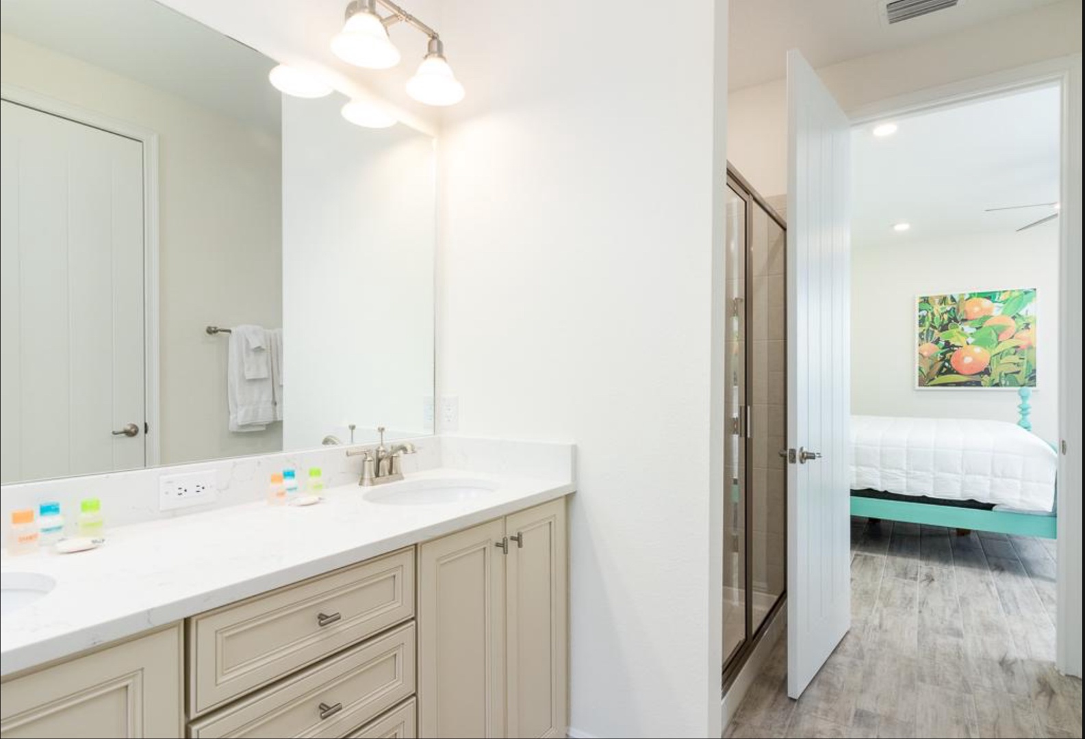 A double vanity & walk-in shower with separate oversize tub ensuite bath