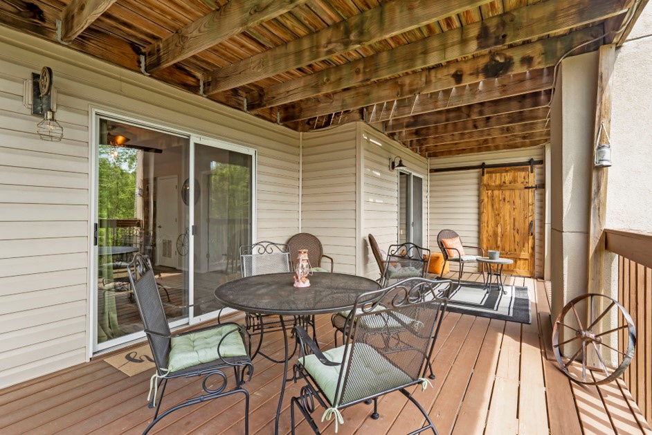 Enjoy outdoor dining with seating for 4 or lounge in the sitting area on the Back Deck