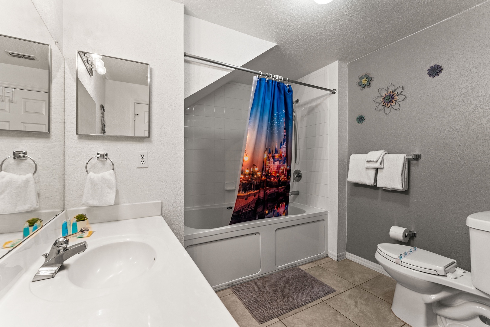 Private ensuite bathroom with a convenient shower/tub combo