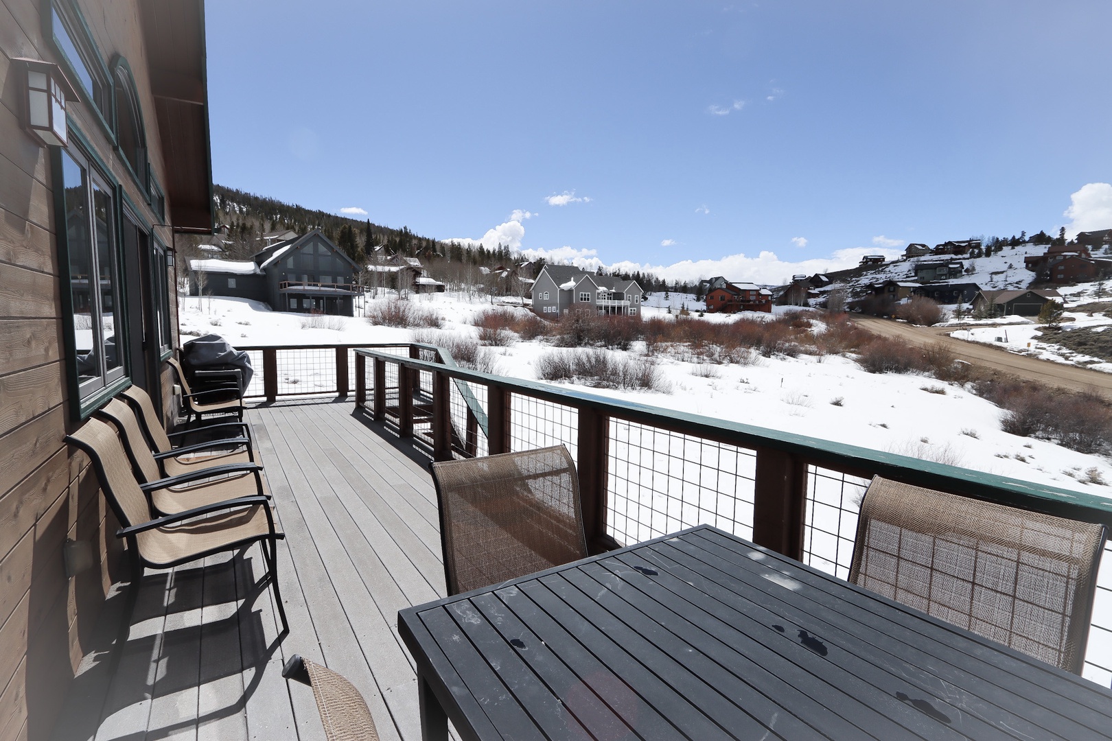 Relax and take in the crisp mountain air while enjoying the expansive views from the spacious deck