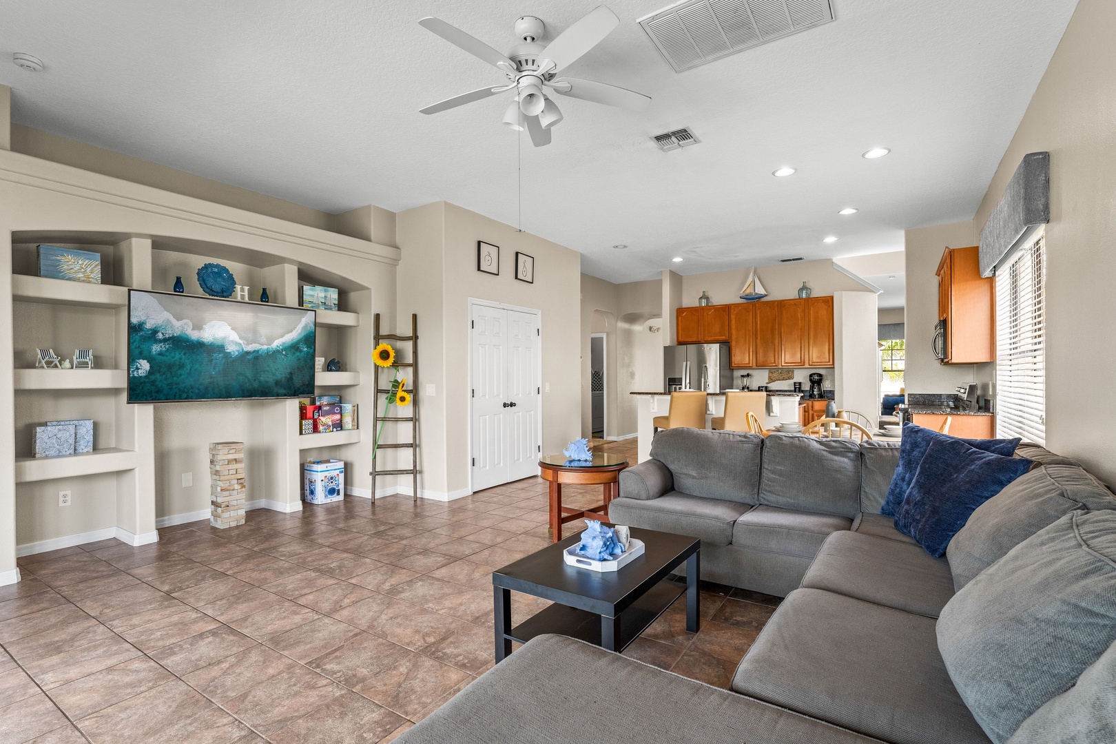 Spacious living area with plush seating, and Smart TV