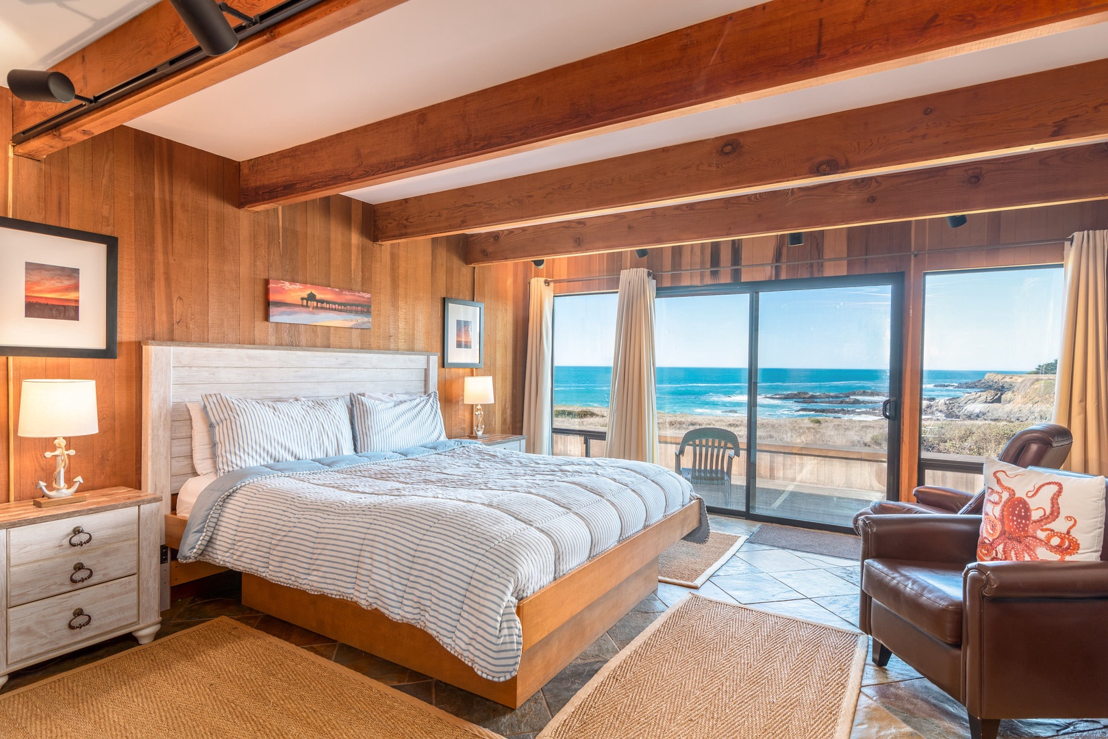 Master bedroom: King bed with ocean view and deck access