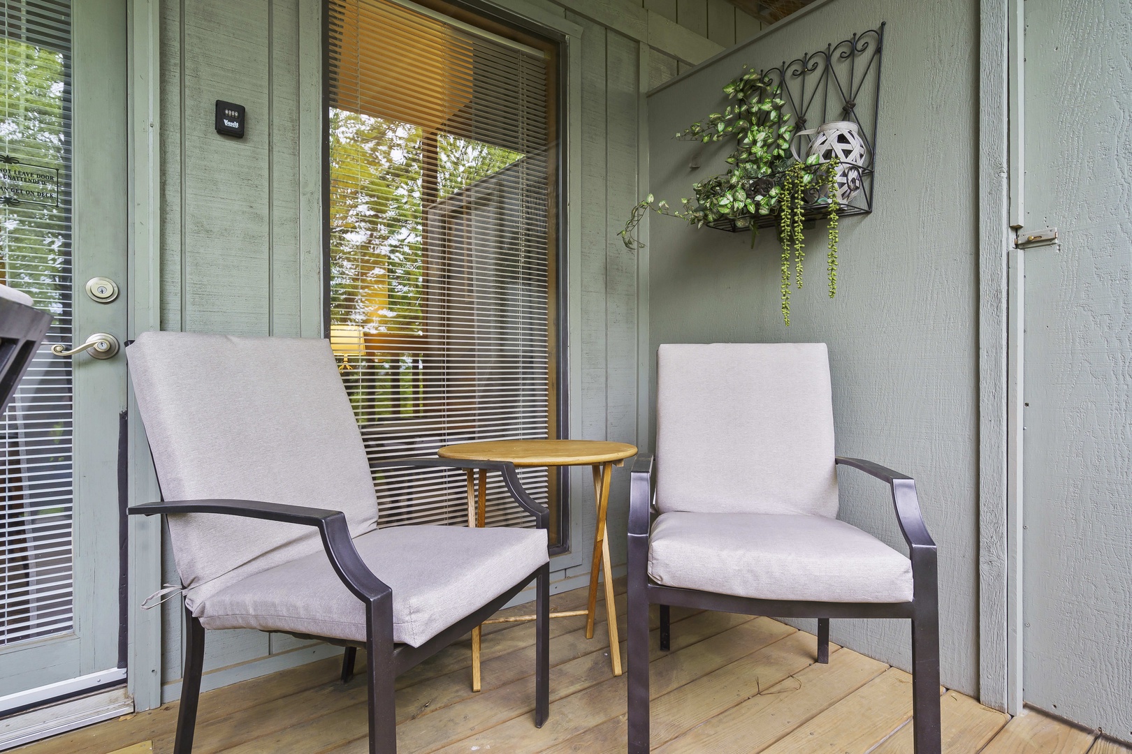Panoramic view from the covered deck with swing and outdoor seating (unit 8)