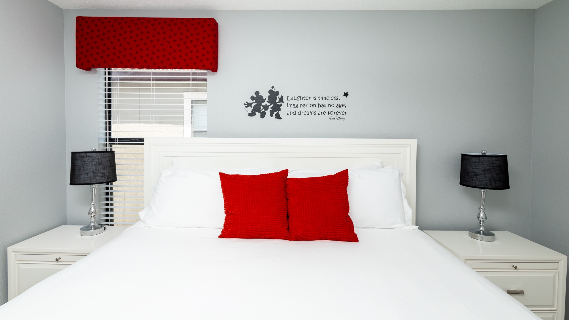 Bedroom 3 Mickey Mouse themed with king bed, Smart TV, and shared ensuite