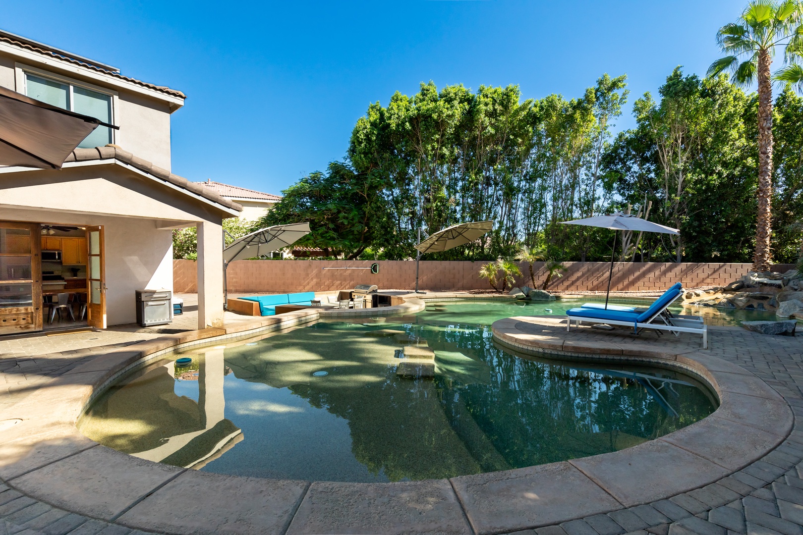 Private pool, adequate seating, firepit area, and grilling area