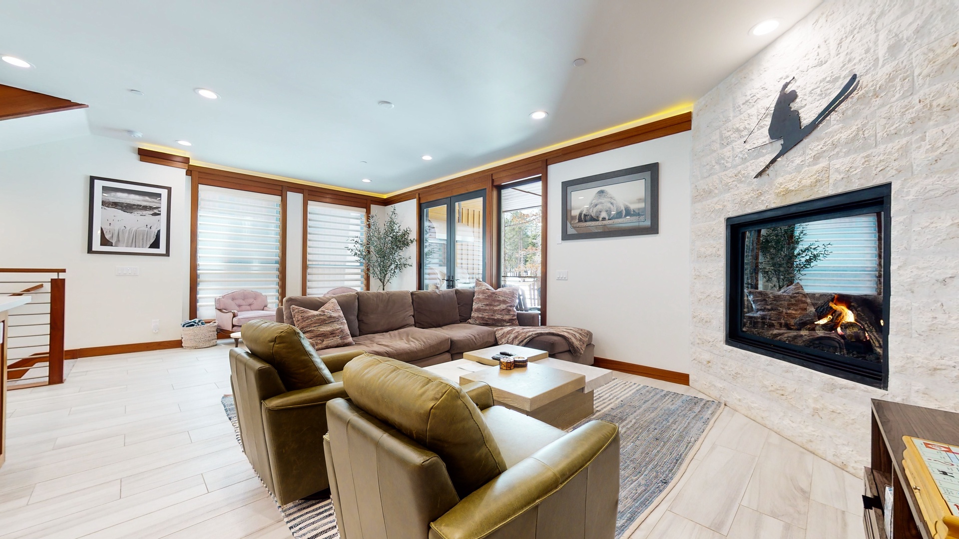 Curl up for a movie or enjoy a warming fire in the living room’s gas fireplace