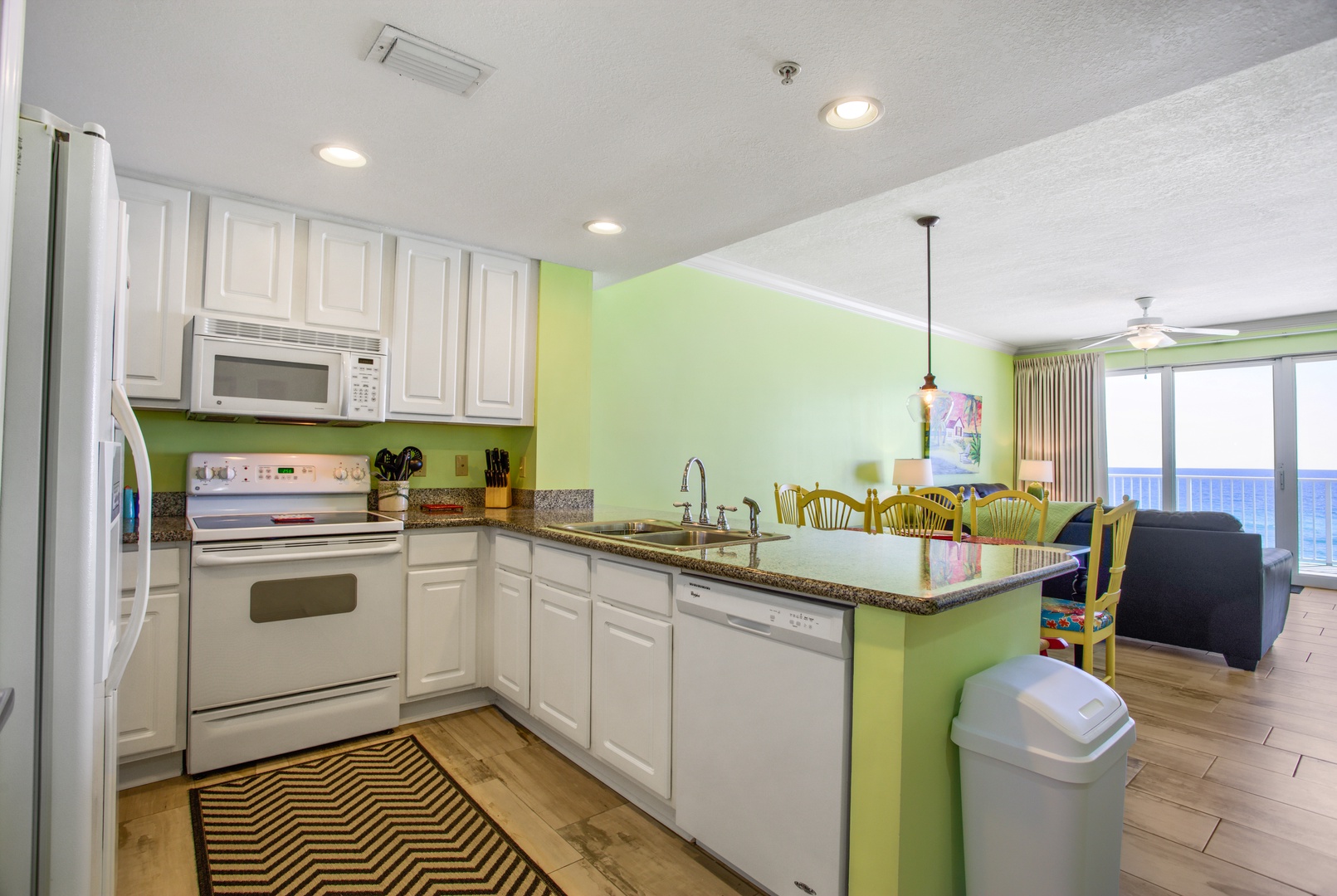 An open, airy kitchen equipped with all the comforts of home