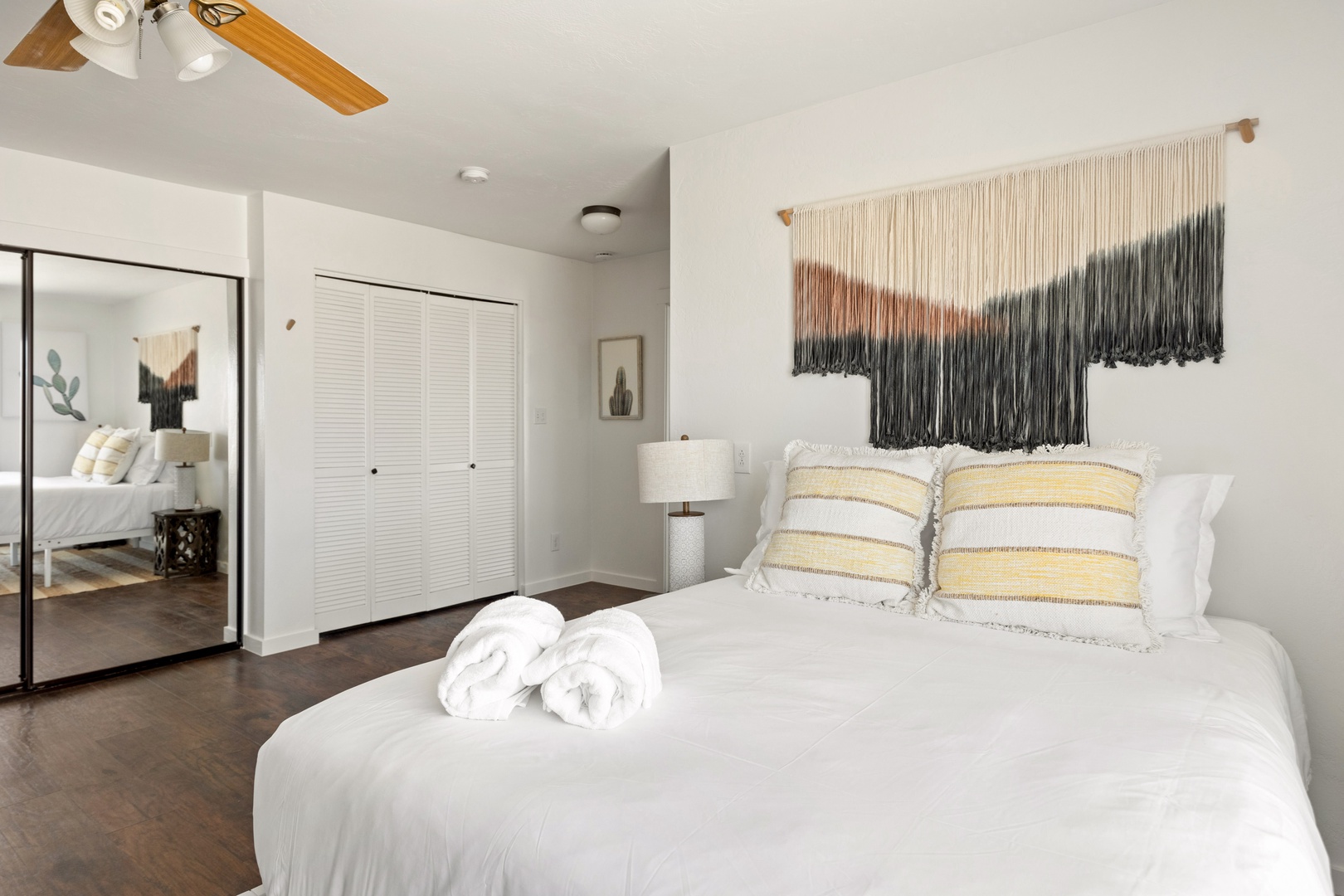 Bedroom 1 (Master) with Queen bed, 2 Twin beds, back yard access, and private en-suite
