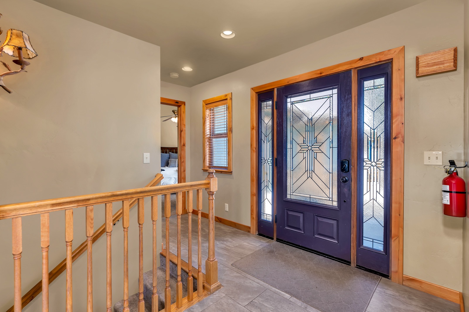 A bright, spacious entryway will welcome you home