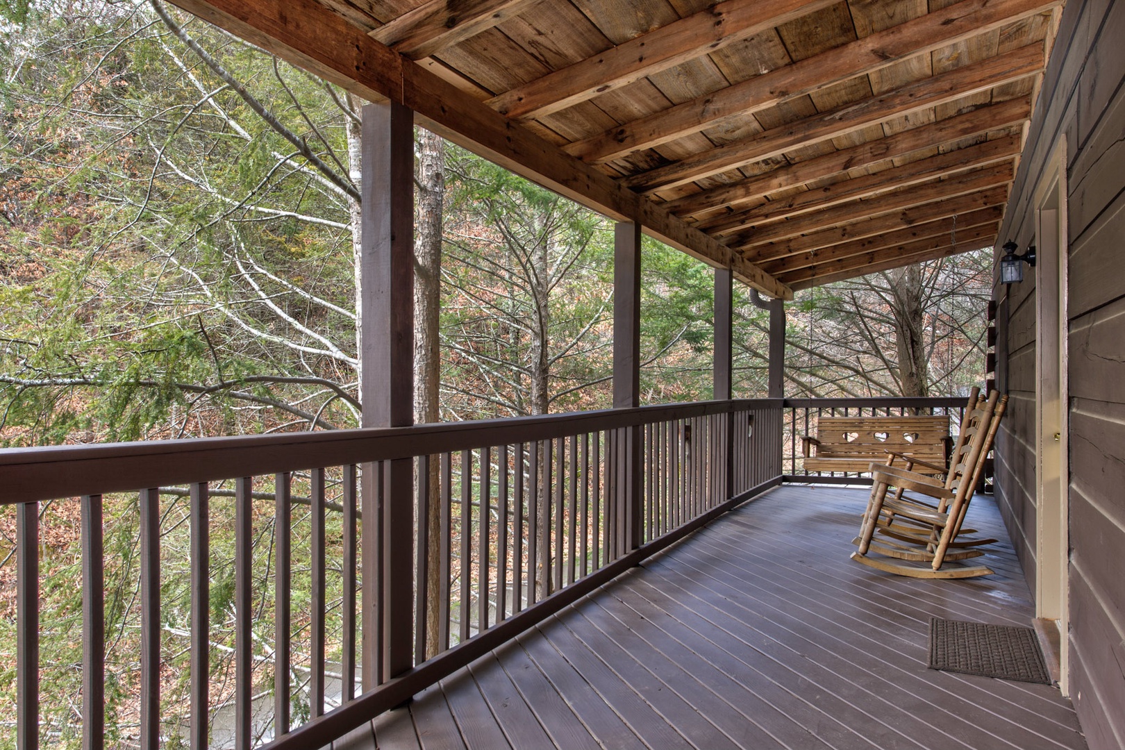 Savor coffee or an evening drink on the deck with treehouse-like views